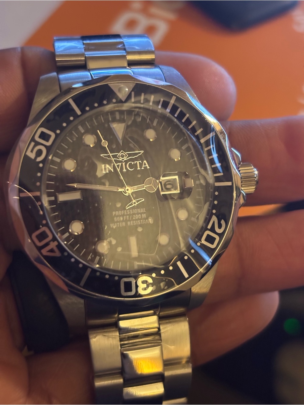 Invicta Silver Watch with Black Dial and Bezel